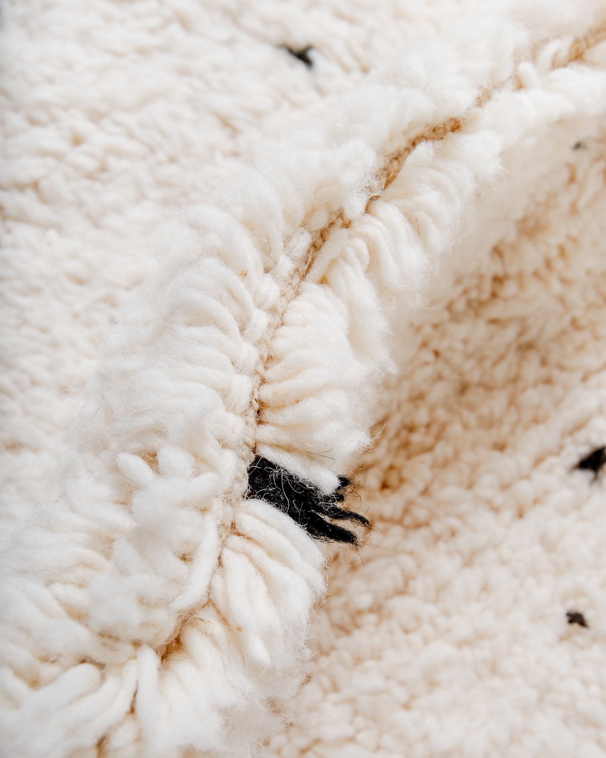 Modern, designer, handcrafted Berber rug from Morocco. Beniourain carpet with beautiful colours and patterns and fluffy wool texture.